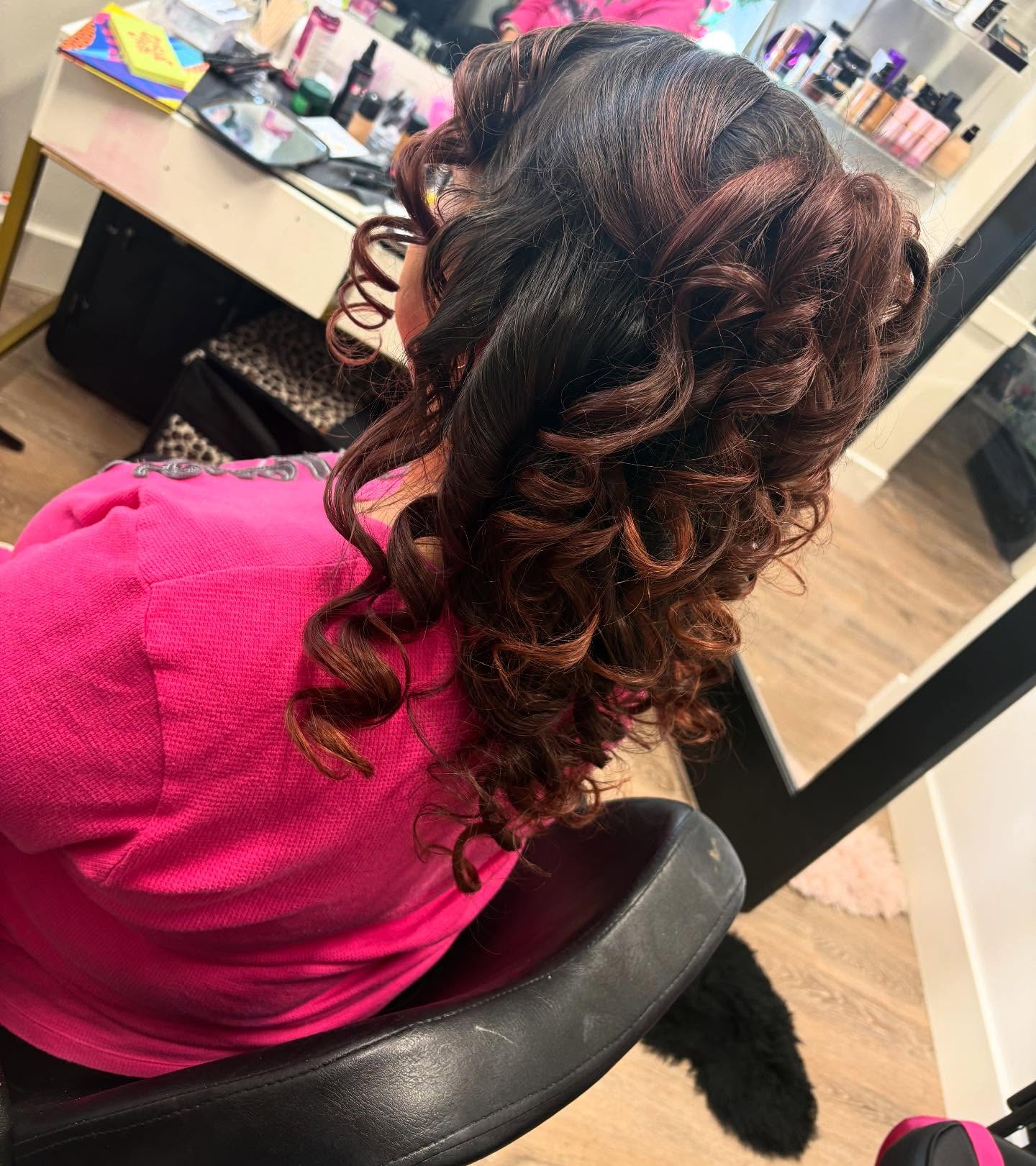 Elegant updo for the mother of the quinceañera