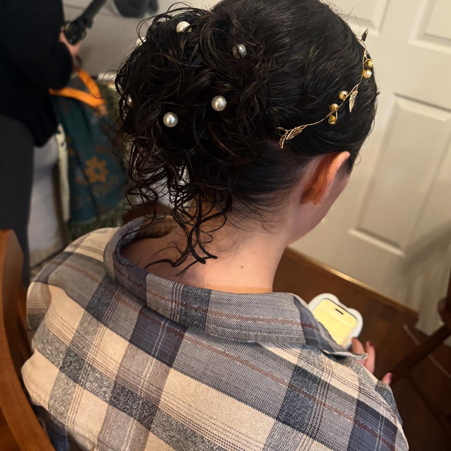 Bridal messy updo using natural curls by MakeupByGen